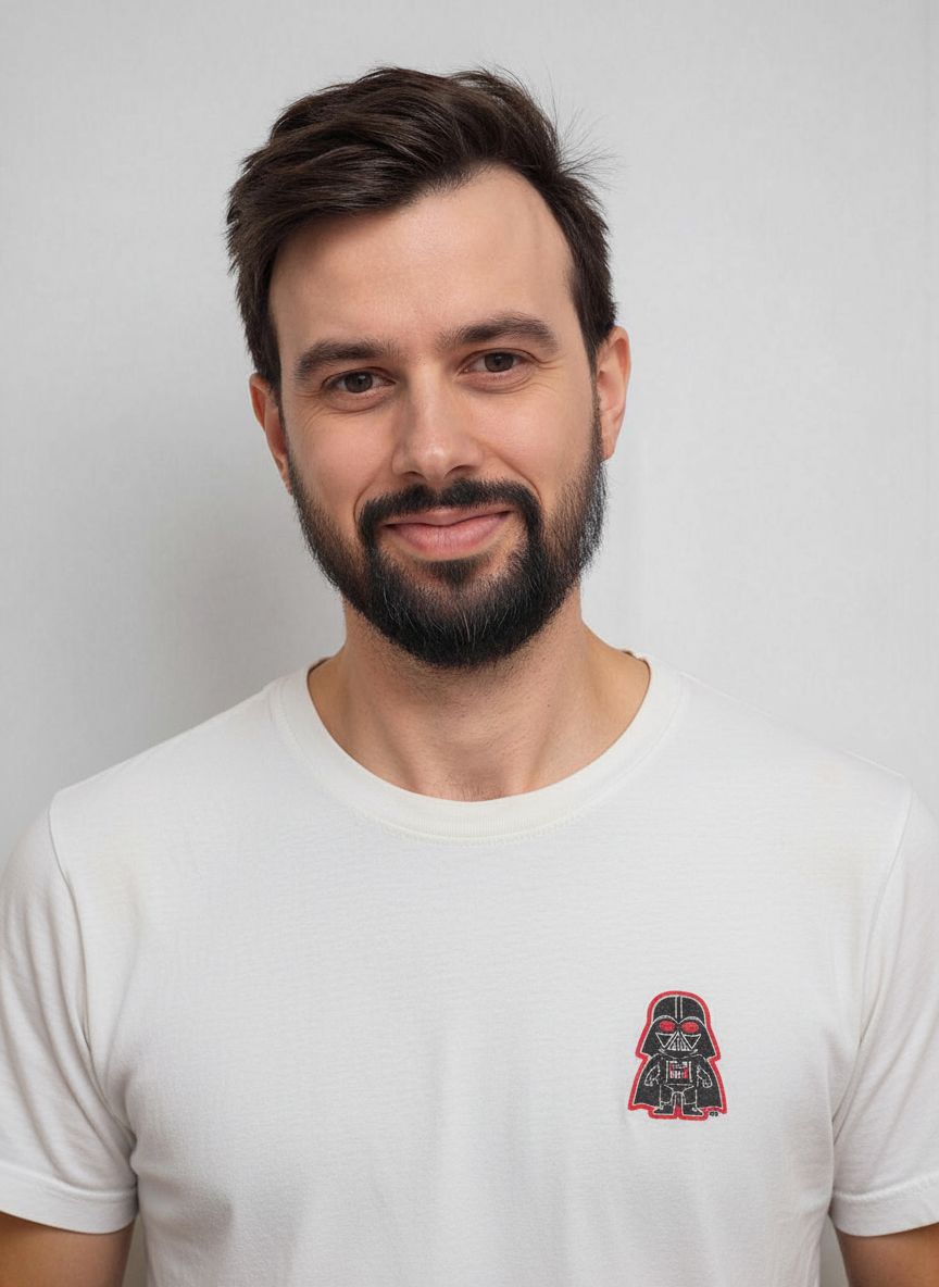 Andrei in white t-shirt with Darth Vader